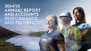 Annual Report front cove with title, three Scottish Water employees against a reservoir and mountain background
