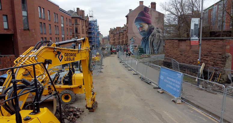 The road remains closed to allow repairs to go ahead High Street Glasgow Sewer Repair